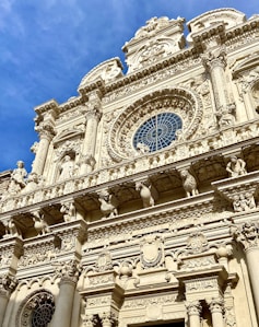a tall building with a clock on the front of it