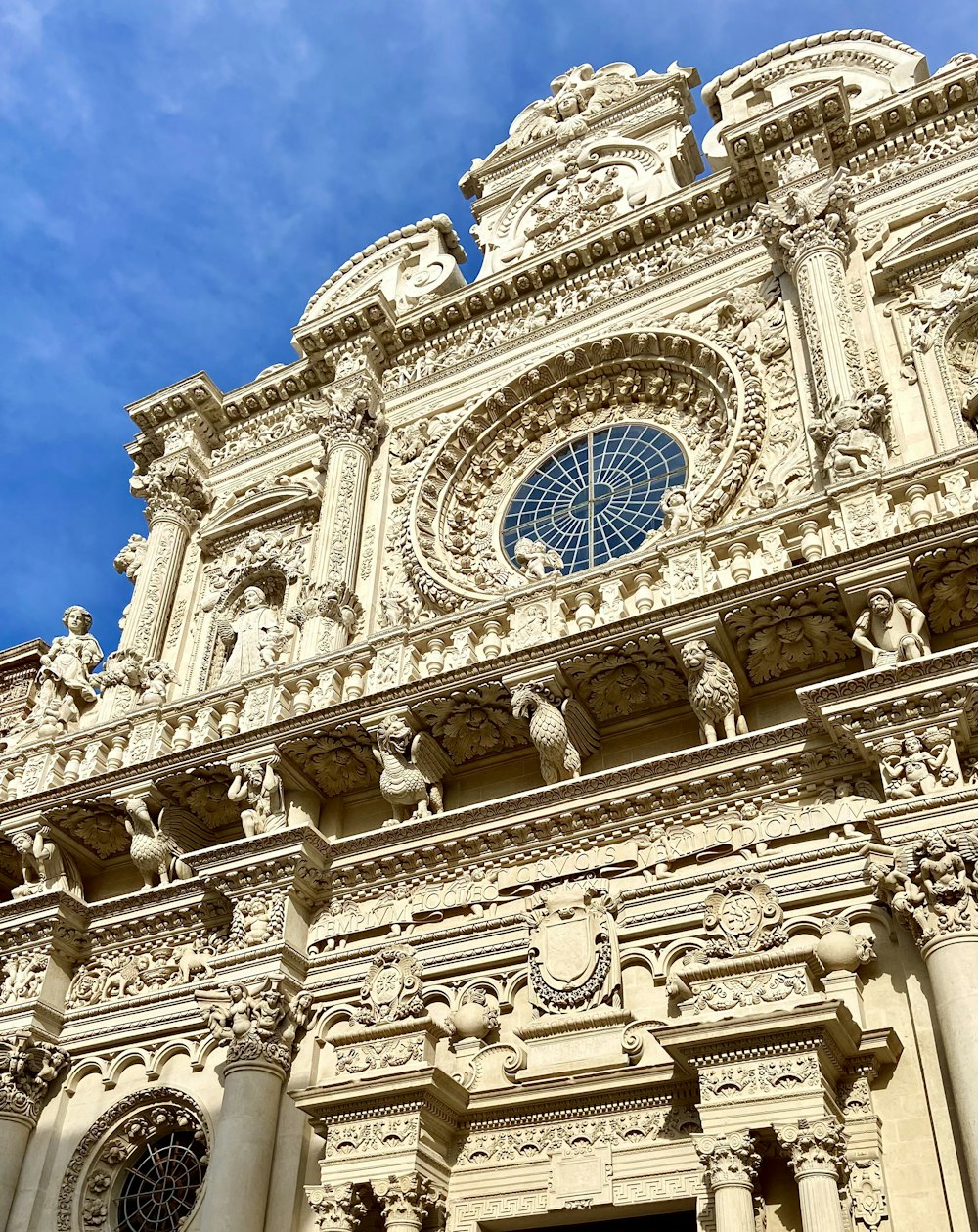 a tall building with a clock on the front of it