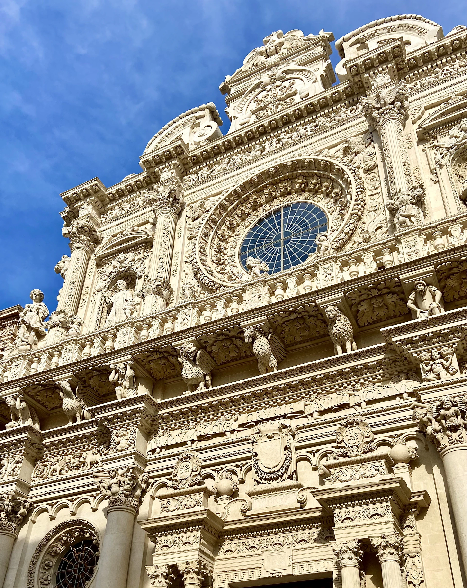 a tall building with a clock on the front of it