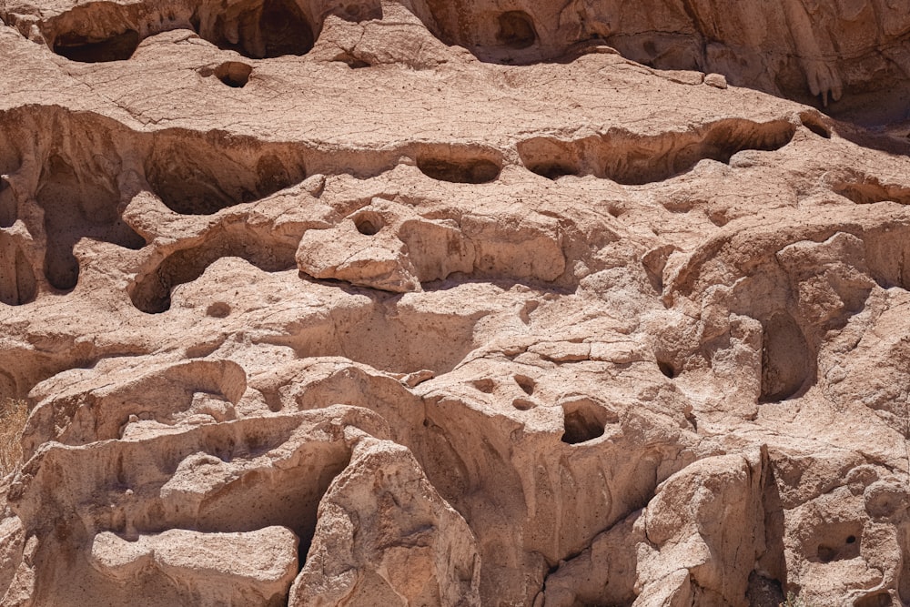 a group of rocks with holes in them