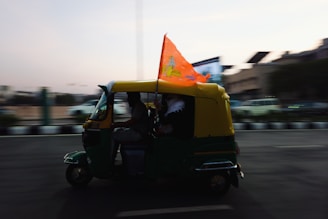 a man driving a rickshaw