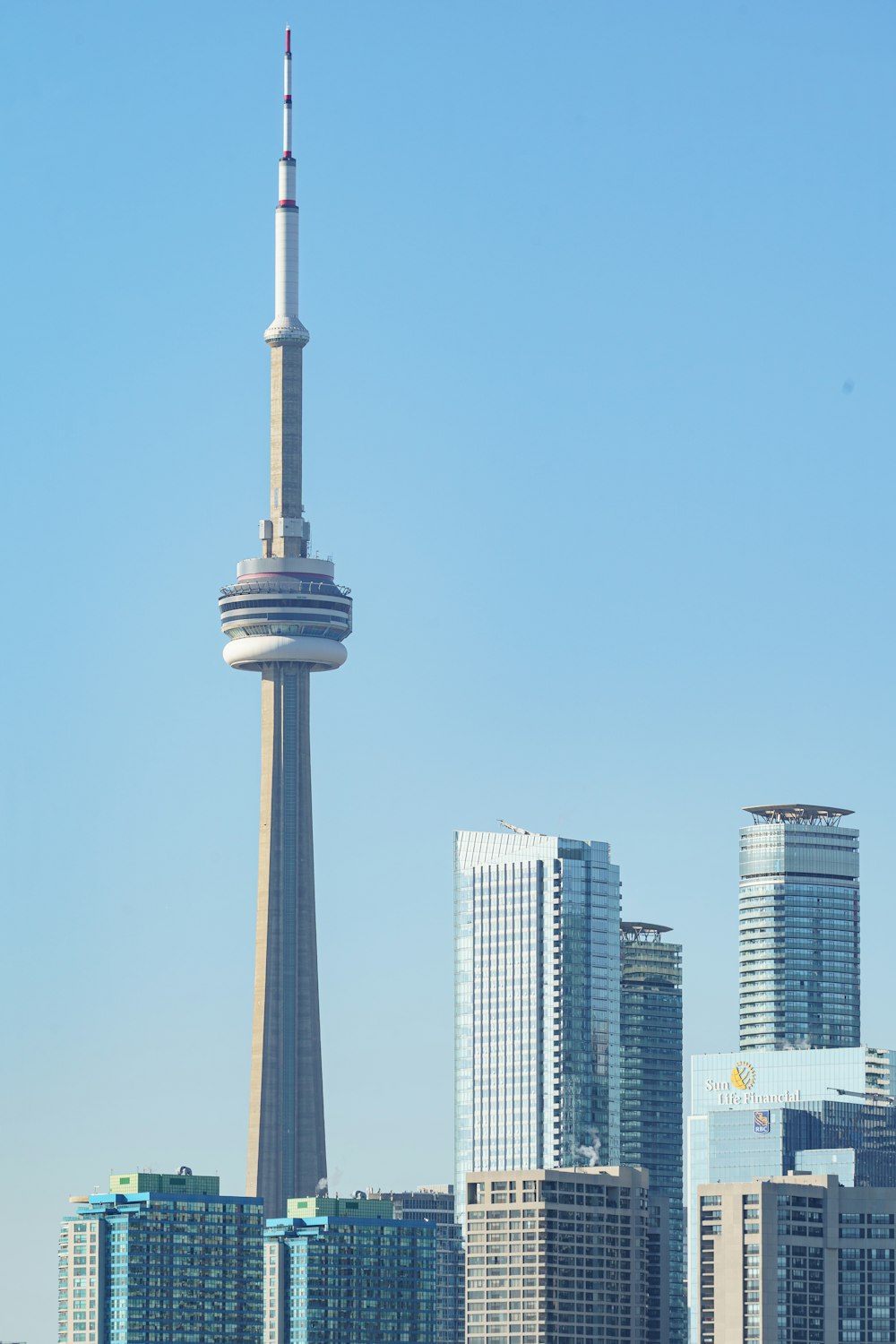 a city with a very tall tower in the middle of it