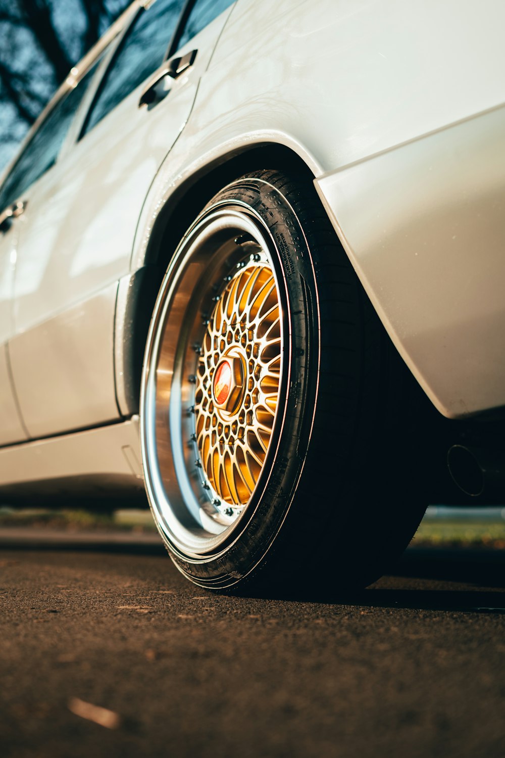 a white car parked on the side of the road