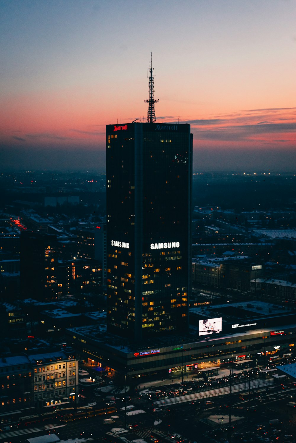 a very tall building in the middle of a city