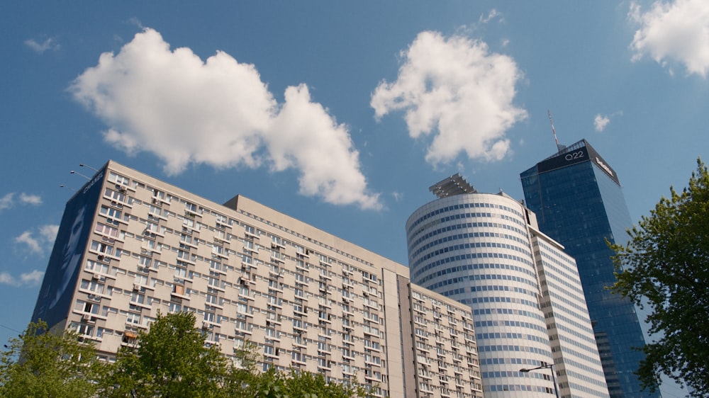 a very tall building sitting next to a very tall building