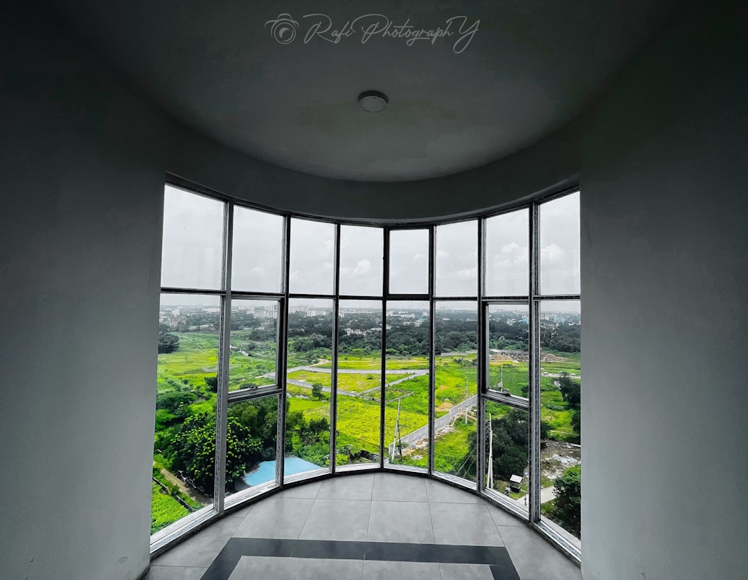 a room with a large window and a view of the countryside, Nature has been the best and the most important thing to do for me to take beautiful capture memories