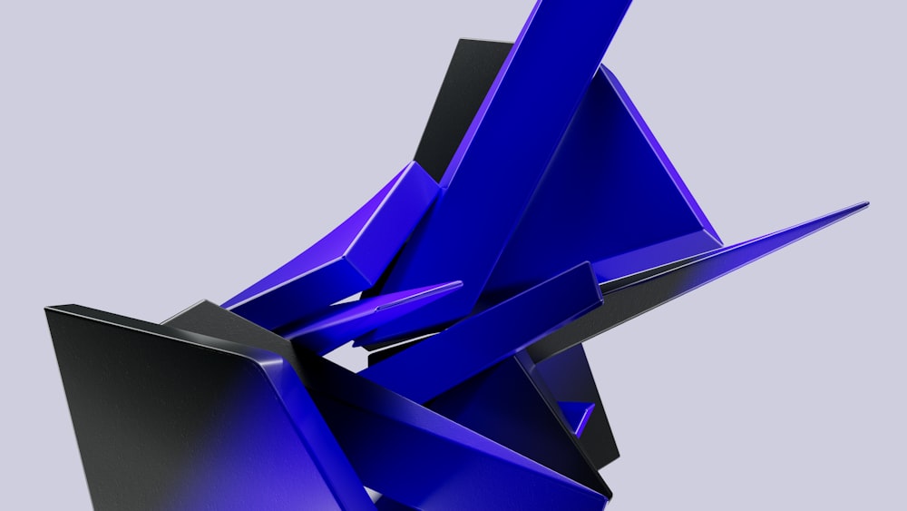 a blue sculpture is shown against a gray background