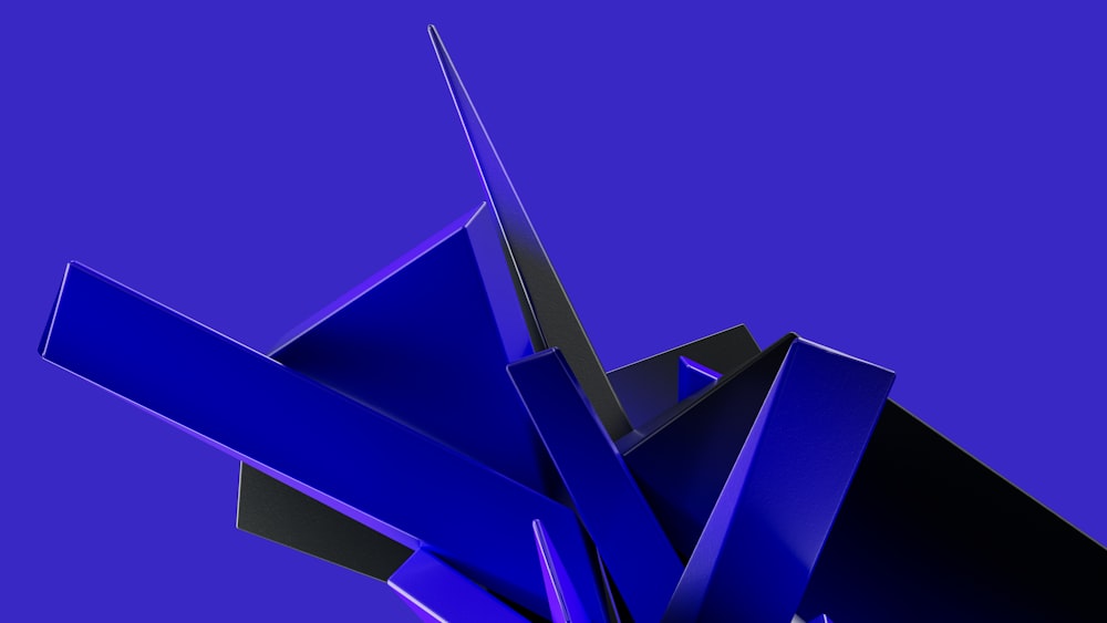 a blue abstract sculpture against a purple background