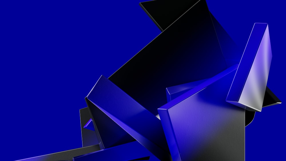 a blue and black abstract object with a blue background