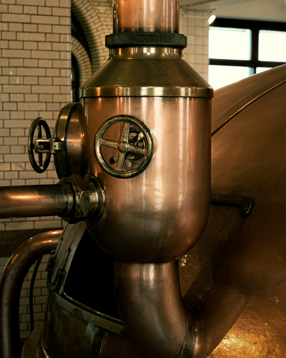 a large metal tank sitting inside of a building