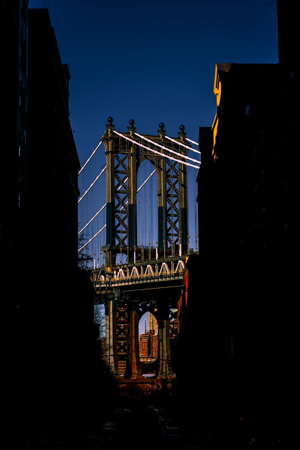 a very tall bridge spanning over a river