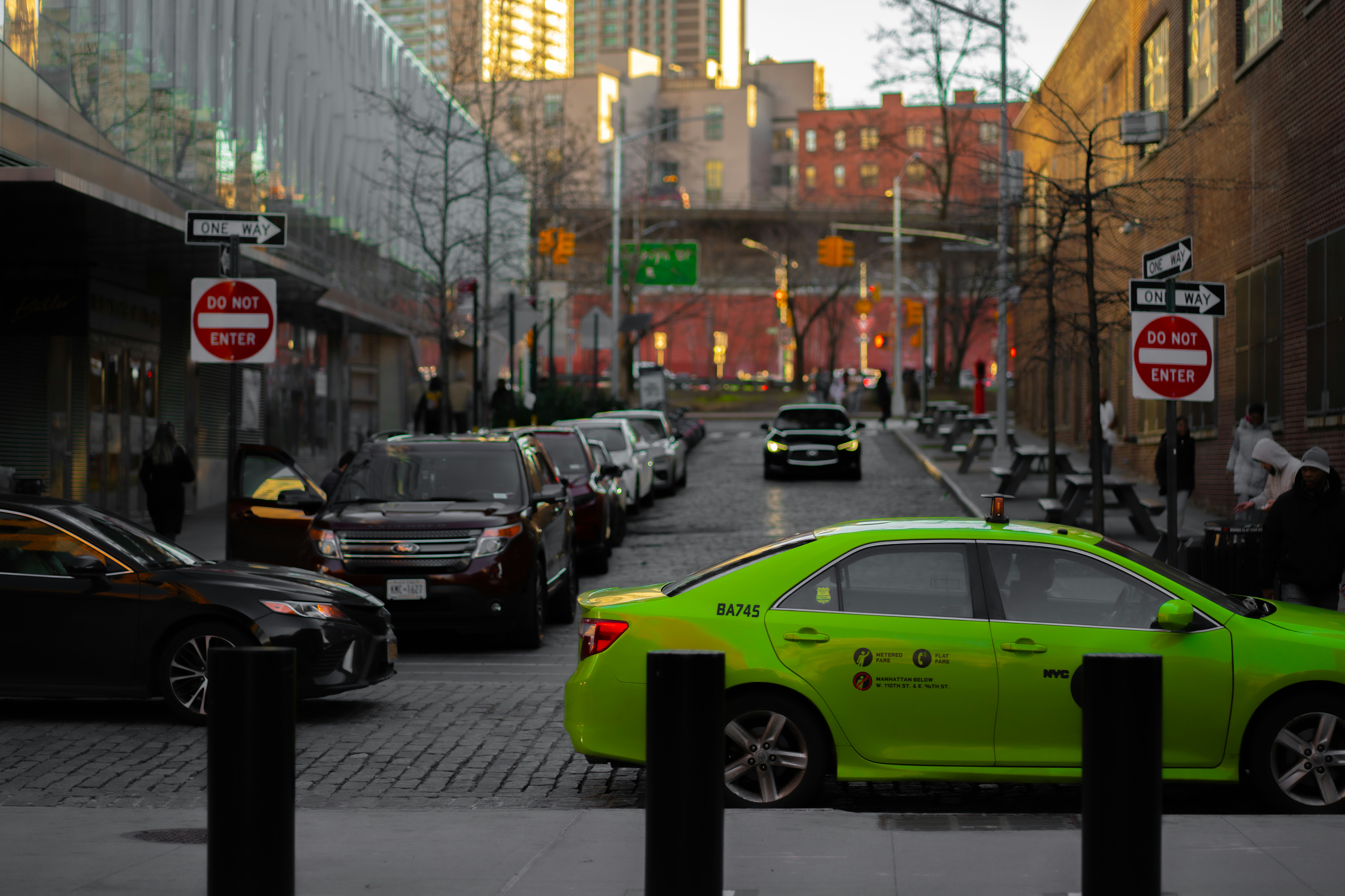 Electric scooter and bike parked near city street charger