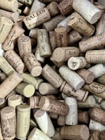 a bunch of wine corks are piled on top of each other