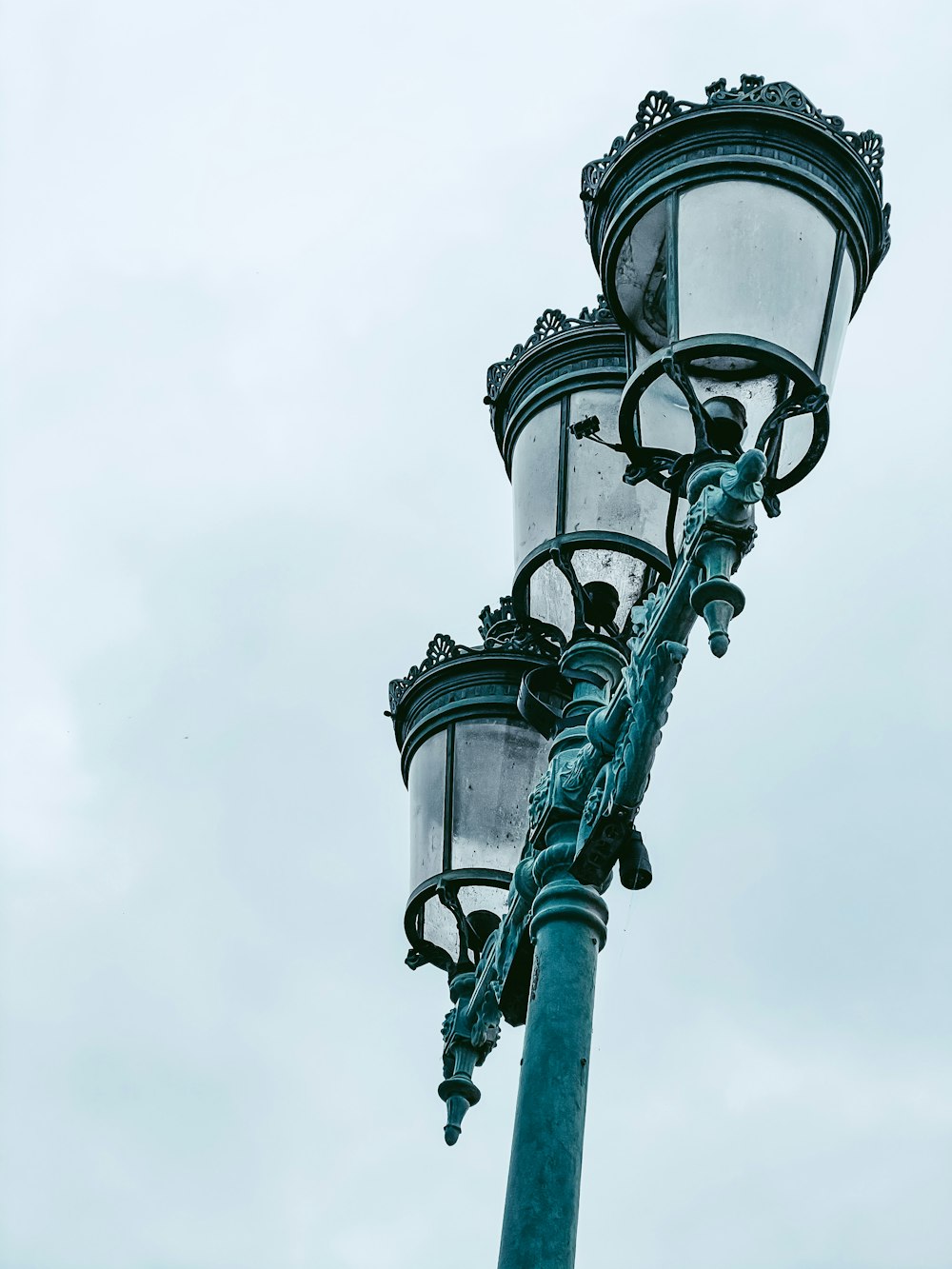 a lamp post with two lights attached to it