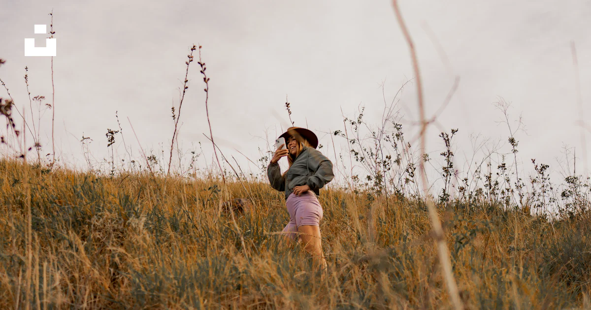 Person Ina Feild A person standing in a field of tall grass photo – Free Photography ...