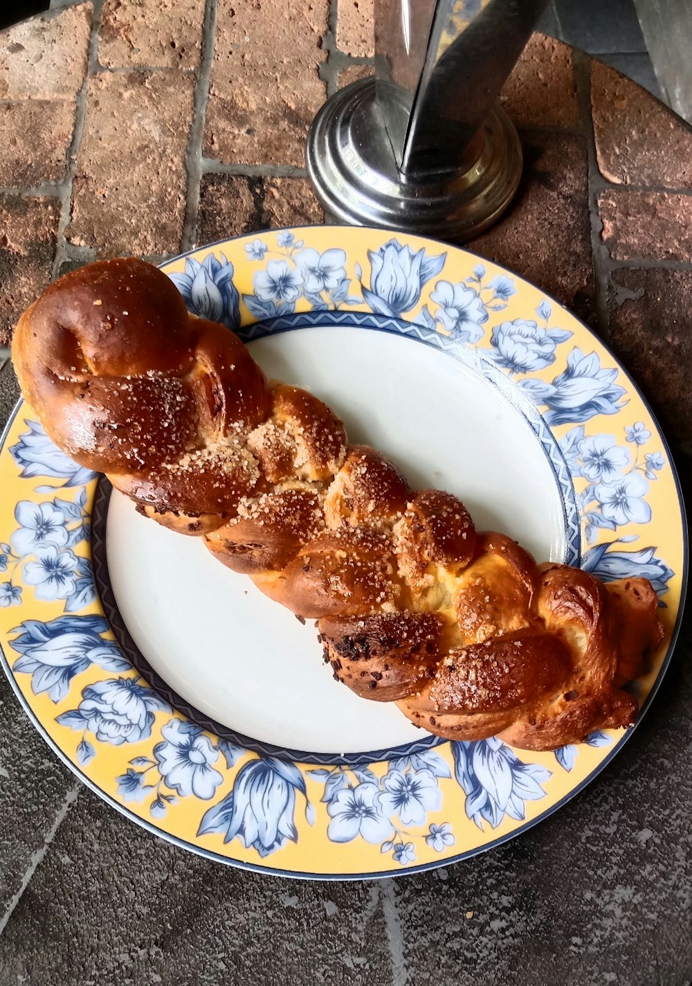 a piece of bread on a plate on a table