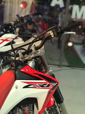 a close up of a motorcycle parked on a street