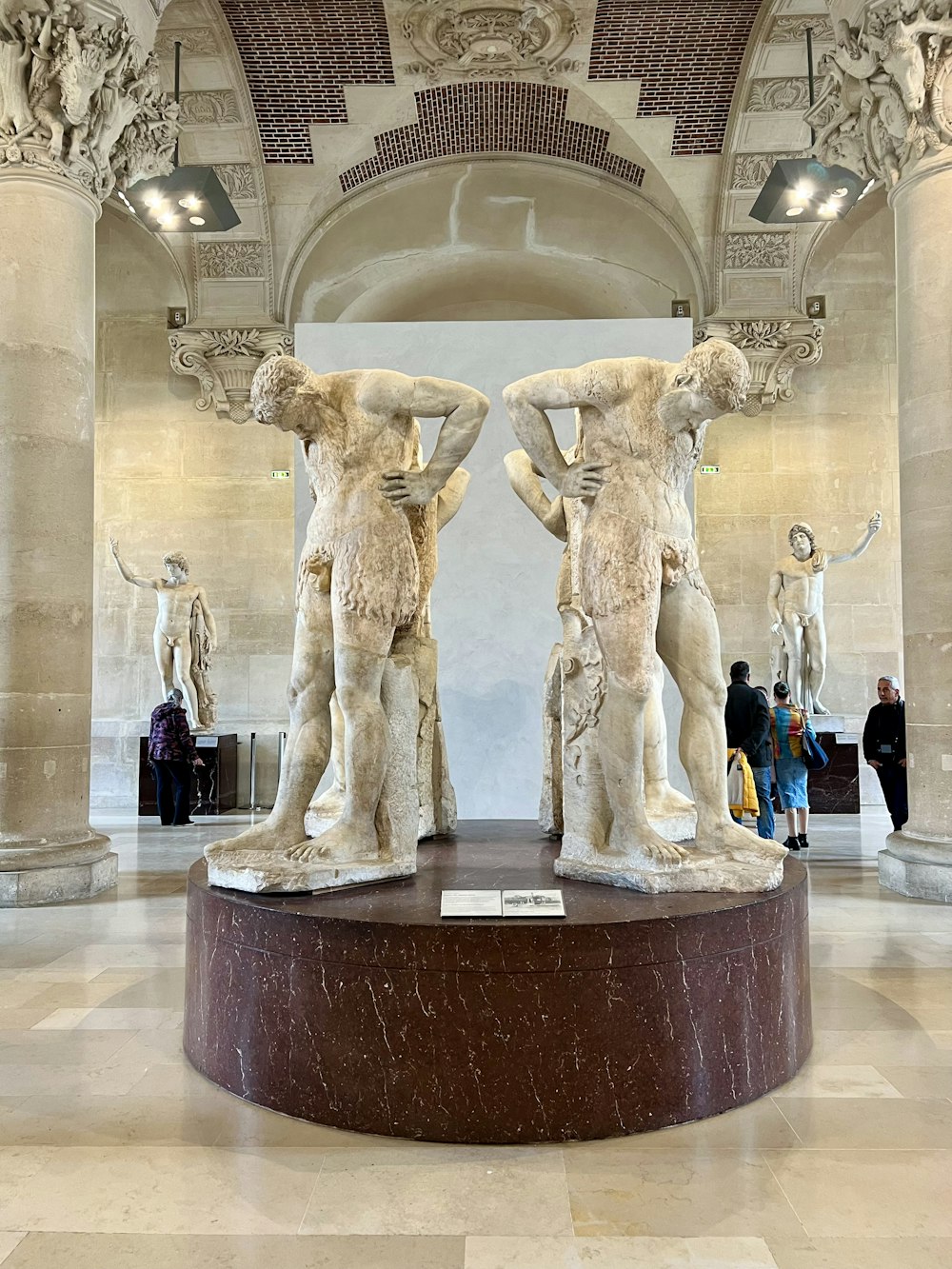 a couple of statues that are in a building