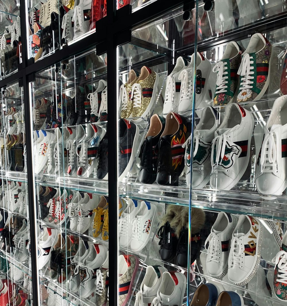 a large display case filled with lots of shoes