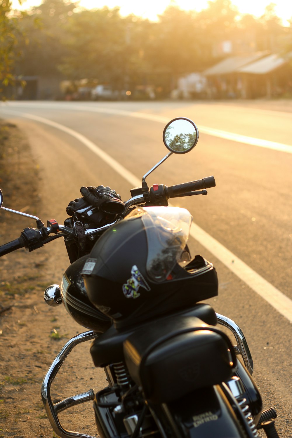 a motorcycle parked on the side of the road