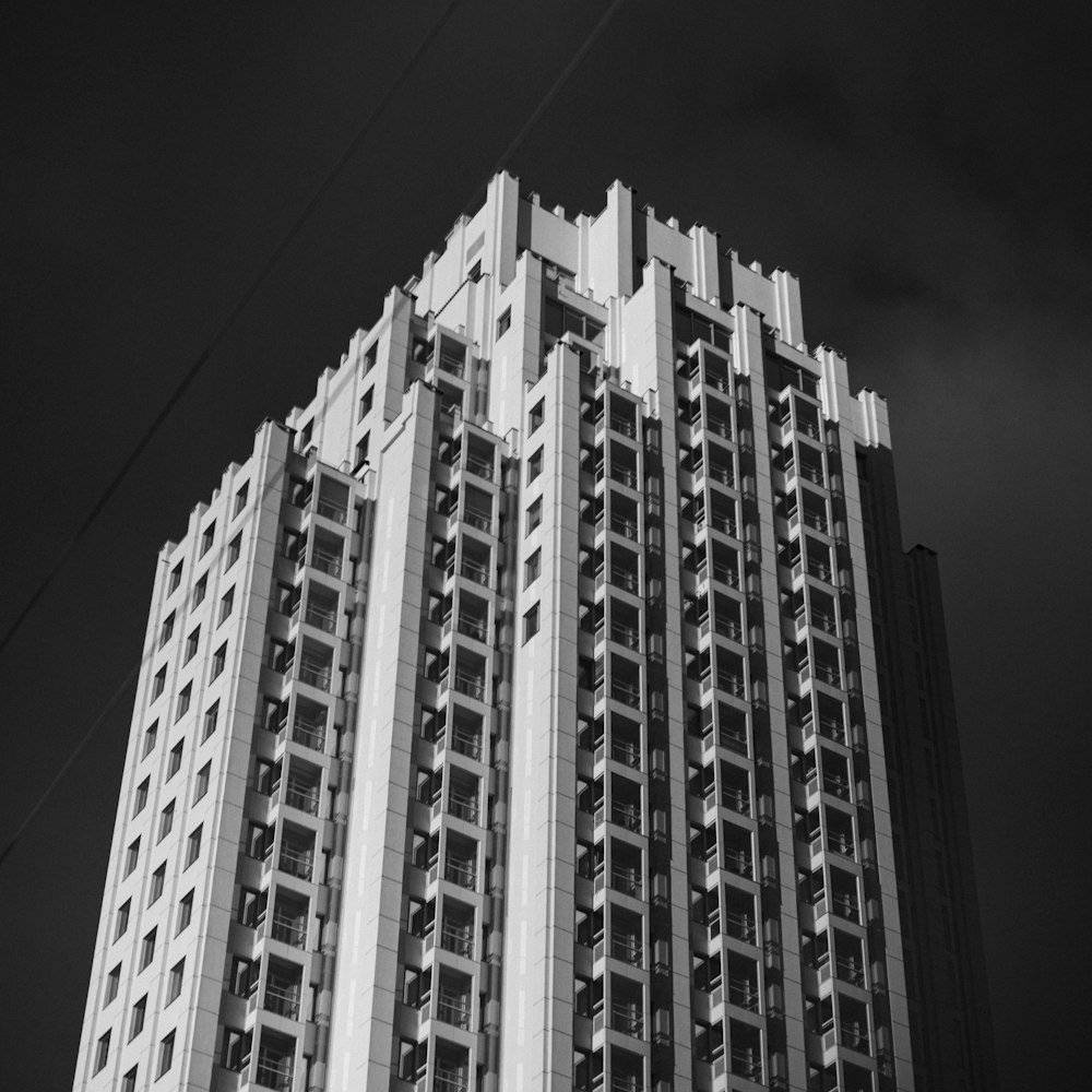 a black and white photo of a tall building