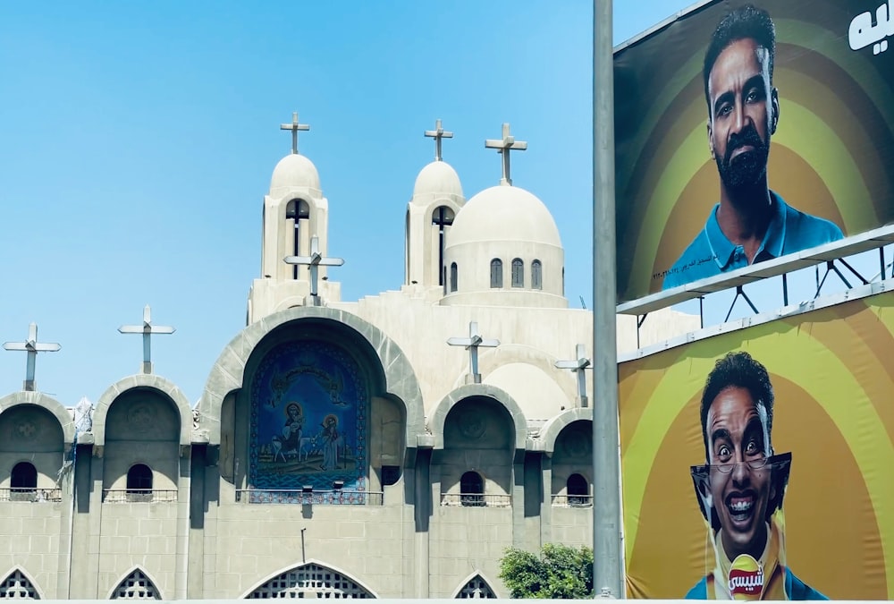 a large building with a large picture of a man on it