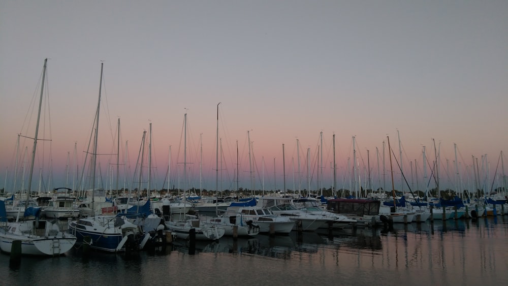 a bunch of boats that are sitting in the water