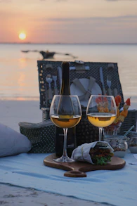 a couple of wine glasses sitting on top of a table