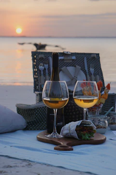 a couple of wine glasses sitting on top of a table