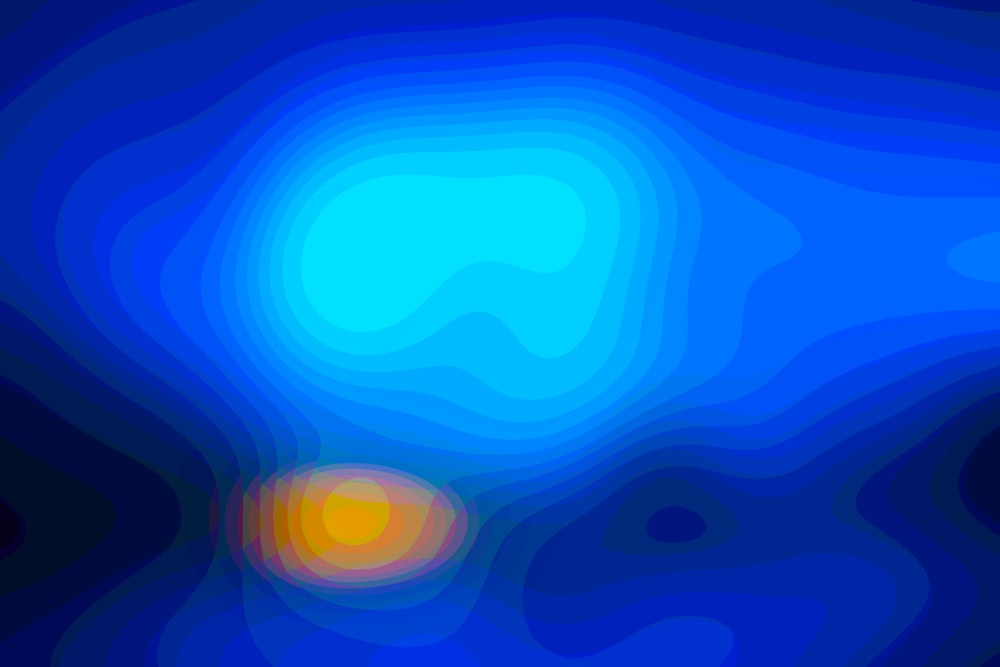 a blurry image of blue and yellow circles
