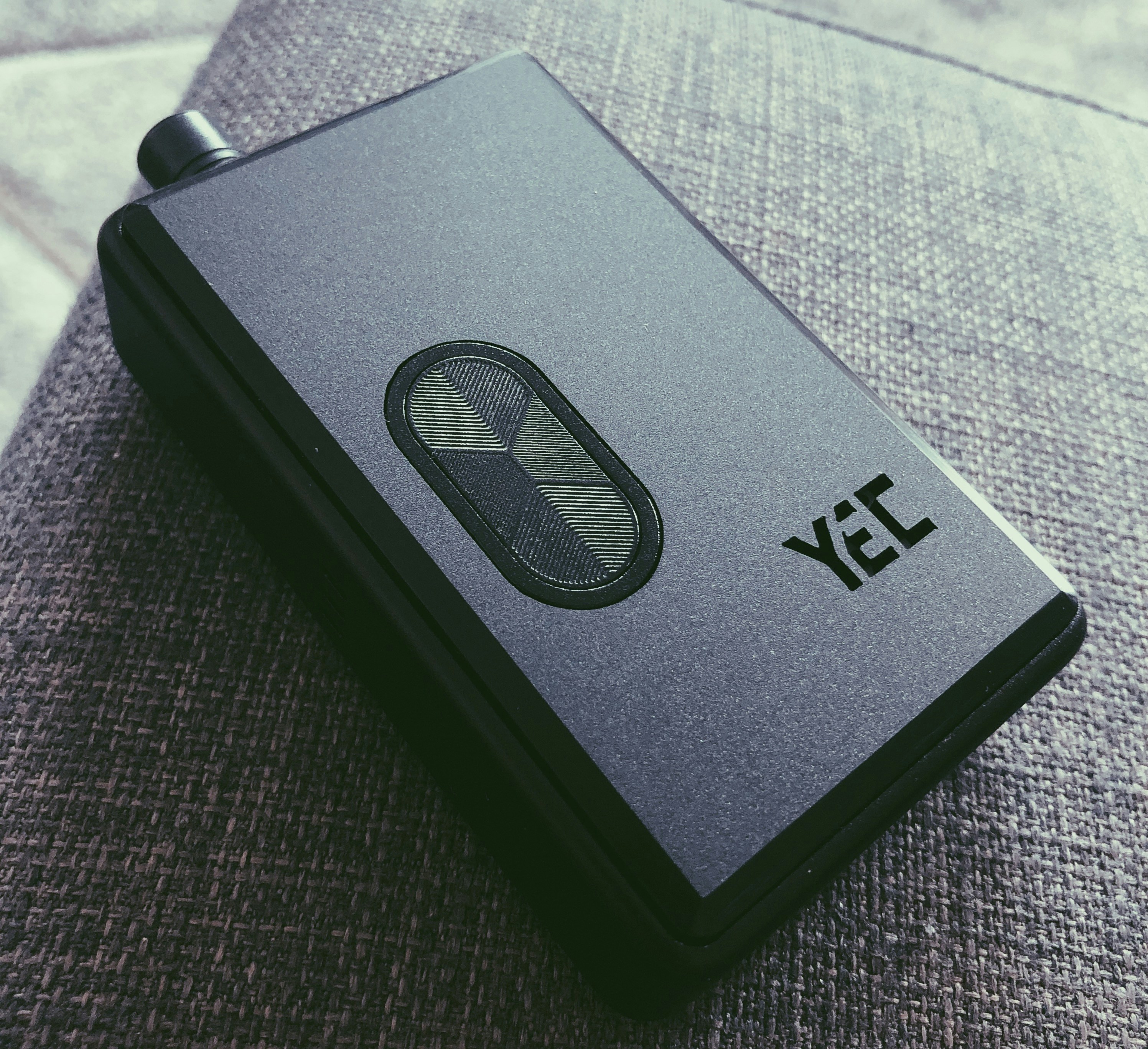 a black notebook with the word yet on it
