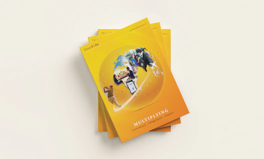 a stack of yellow pamphlets on top of each other
