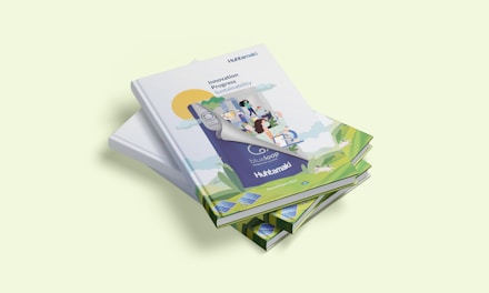 a stack of three books sitting on top of each other