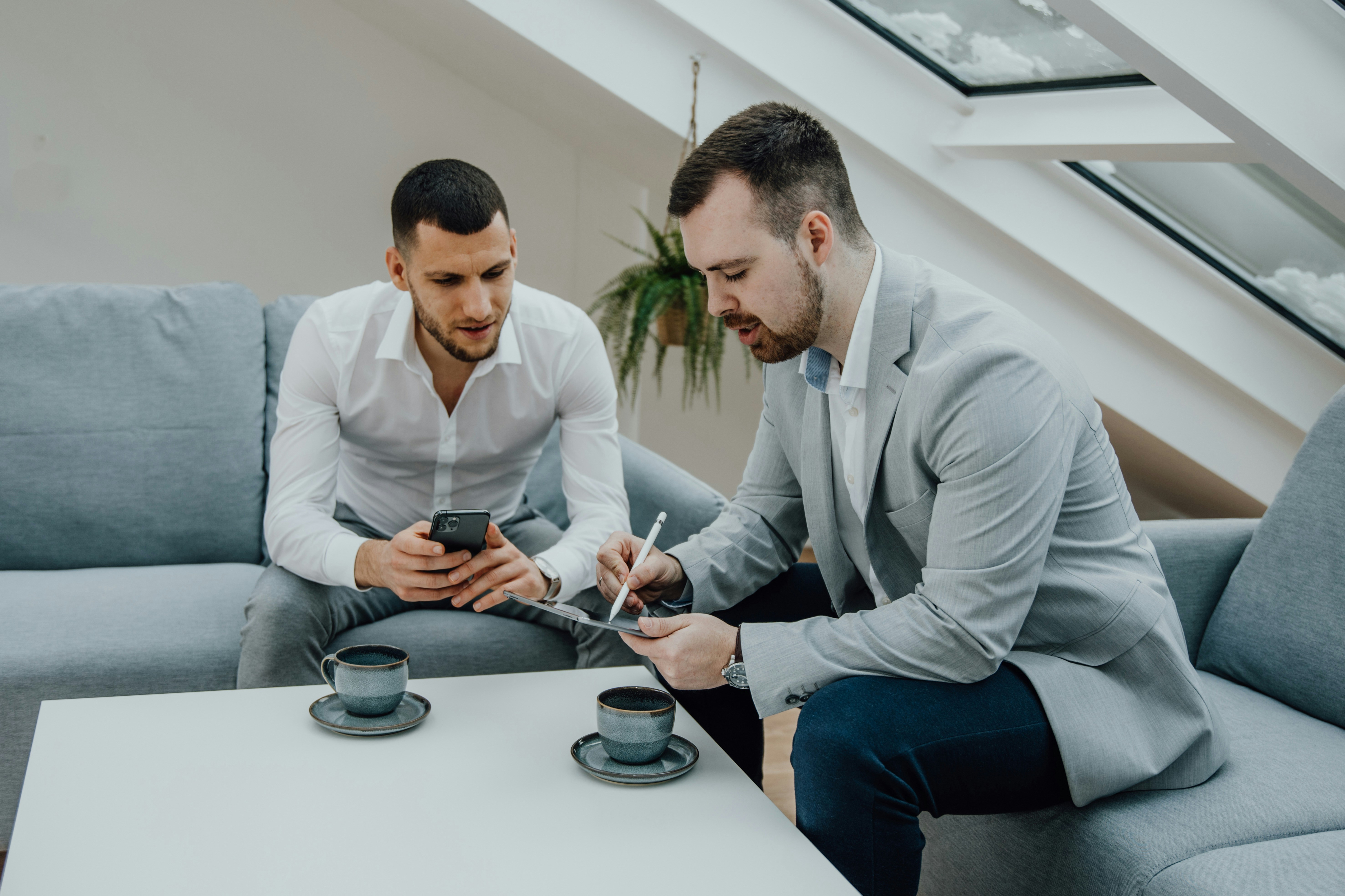 Marketing professionals analyzing mobile campaign data