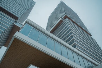 a very tall building sitting next to a very tall building