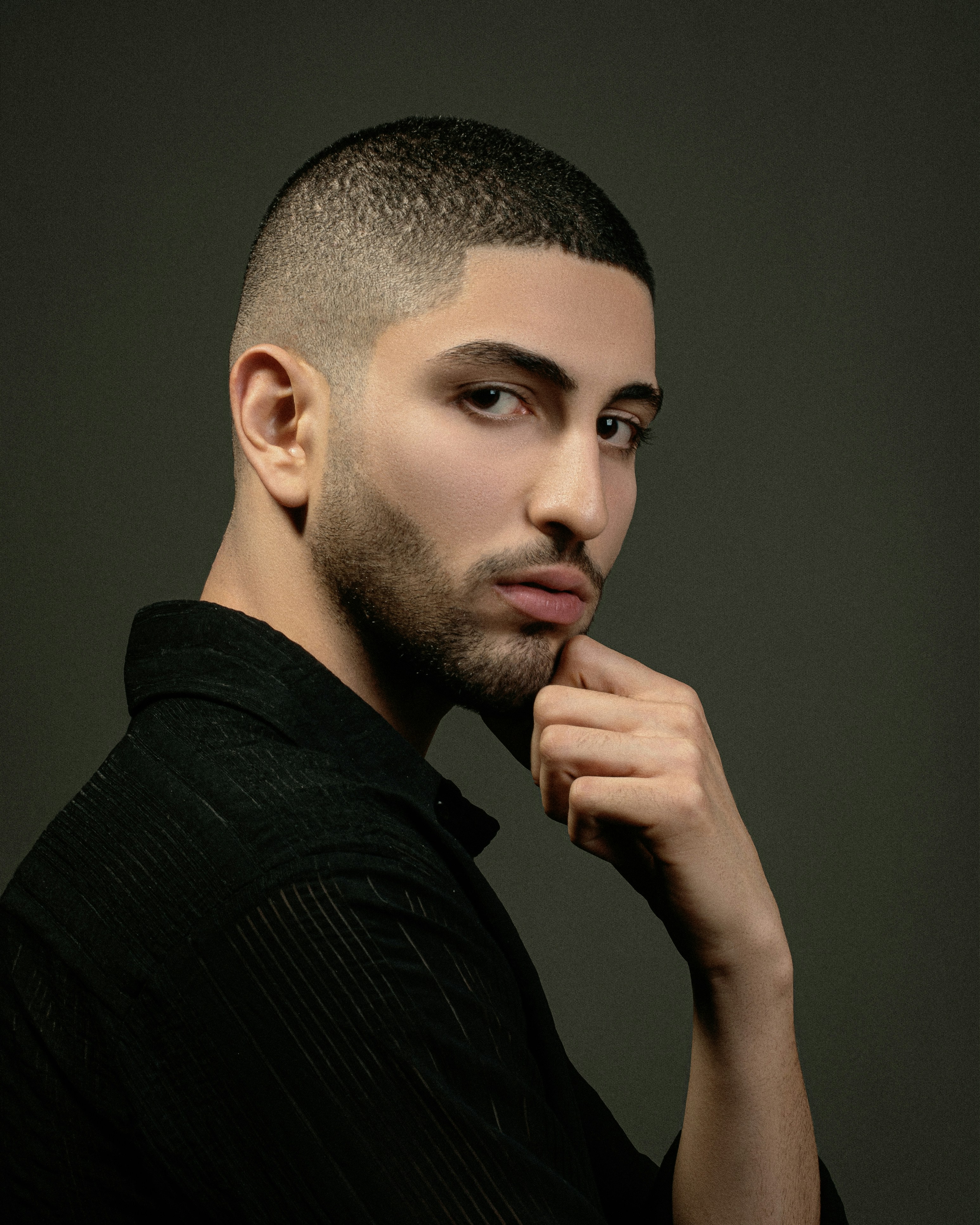 great photo recipe,how to photograph instagram ax.behrooz; a man with a shaved head and a black shirt