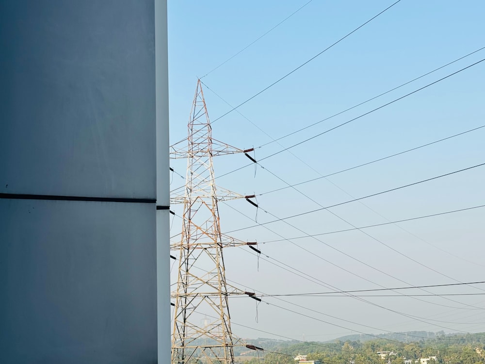 a view of a high voltage power line from a building