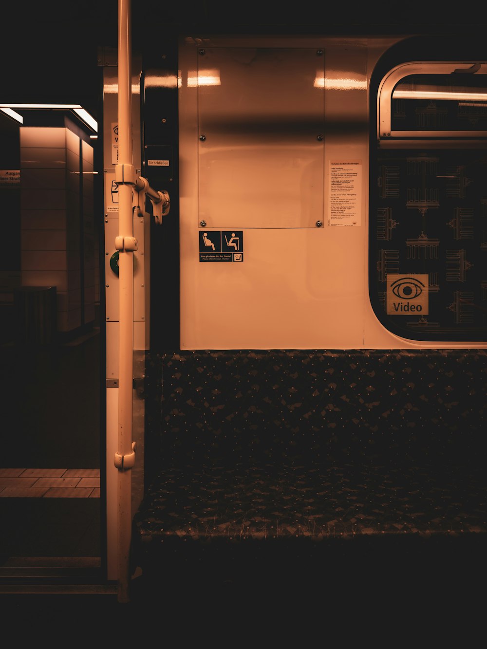 a subway car with the door open at night