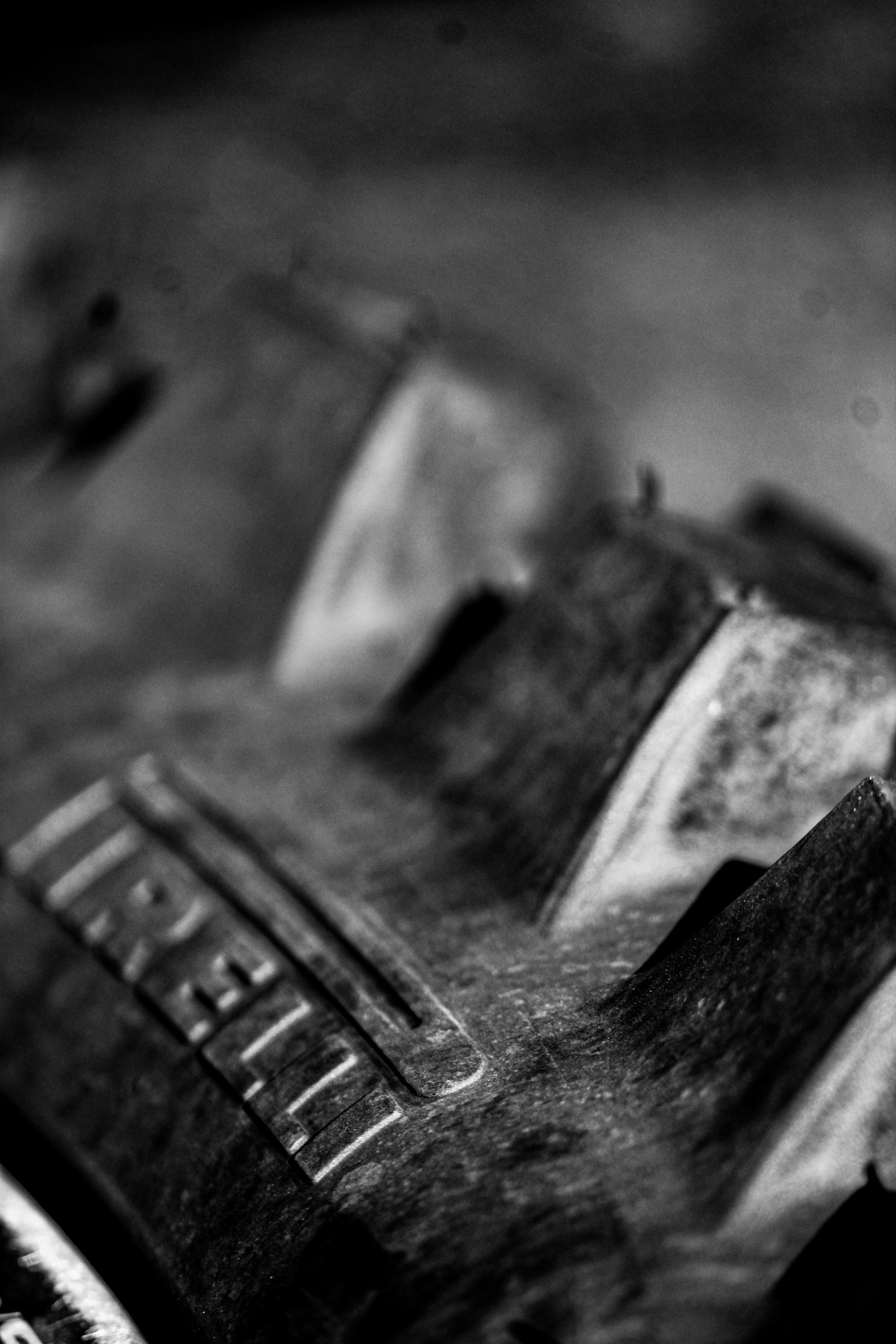 a close up of a black and white photo of a shoe