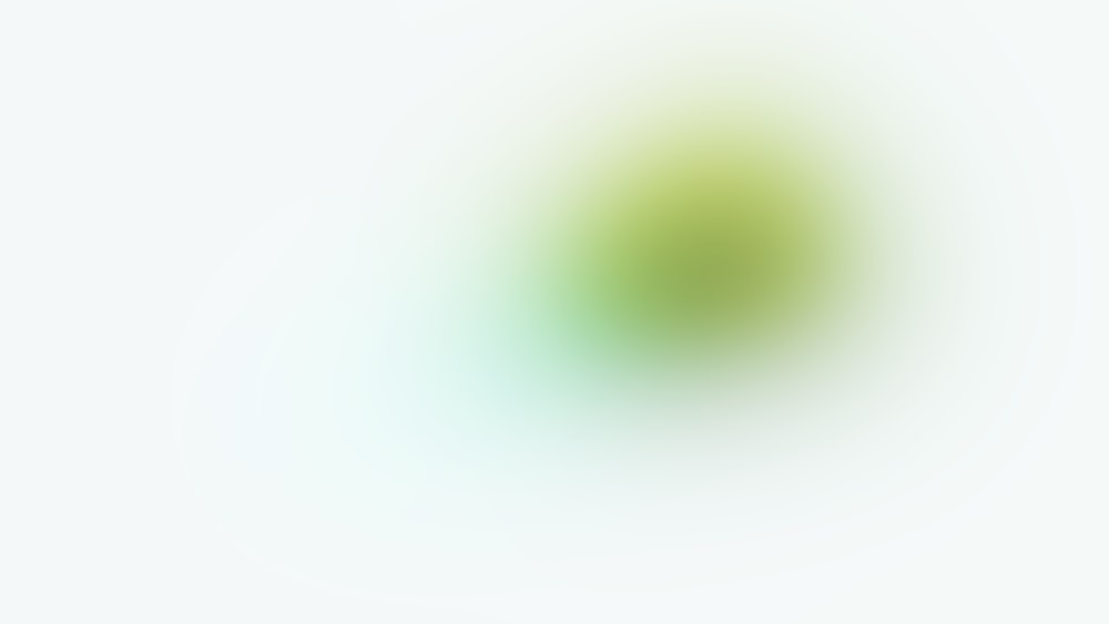uma imagem desfocada de um objeto verde e branco