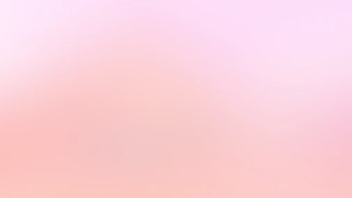a blurry image of a pink and white background