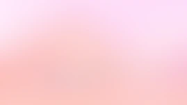 a blurry image of a pink and white background