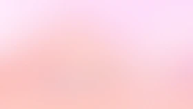 a blurry image of a pink and white background