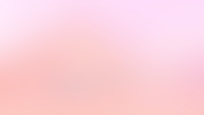 a blurry image of a pink and white background