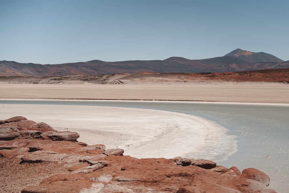 a large body of water surrounded by mountains