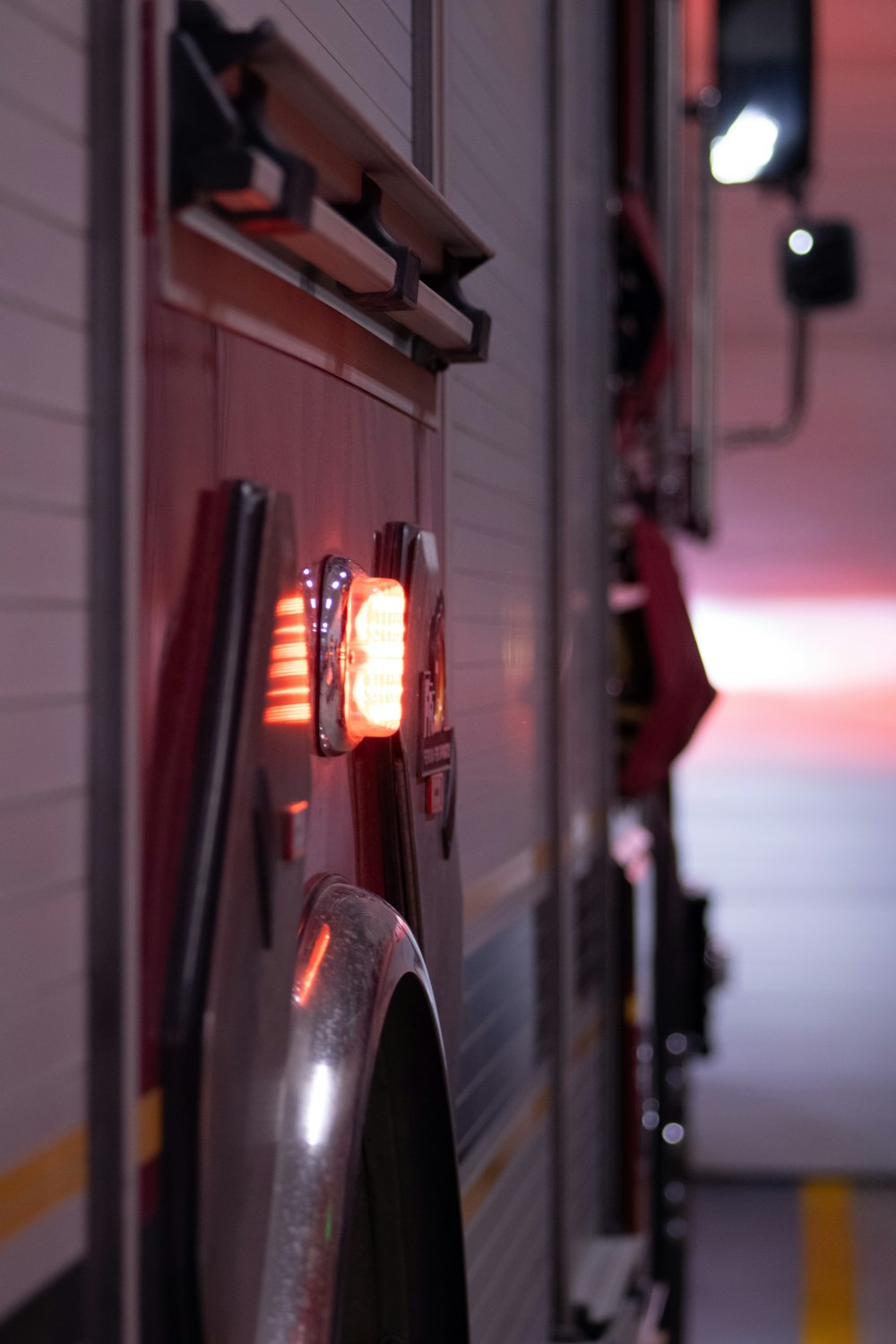 a close up of a fire truck with its lights on