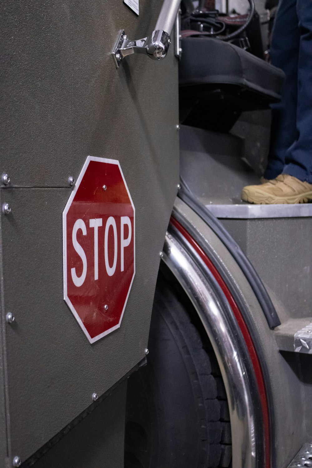 a stop sign on the side of a vehicle
