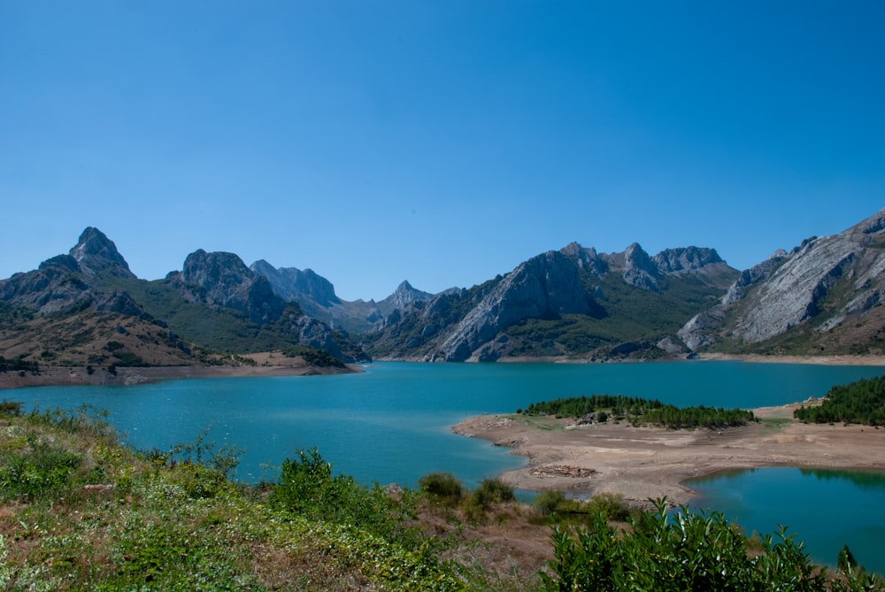 a large body of water surrounded by mountains