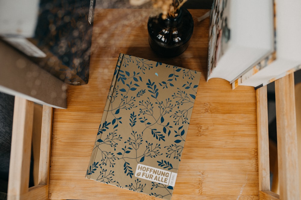 a book sitting on top of a wooden table