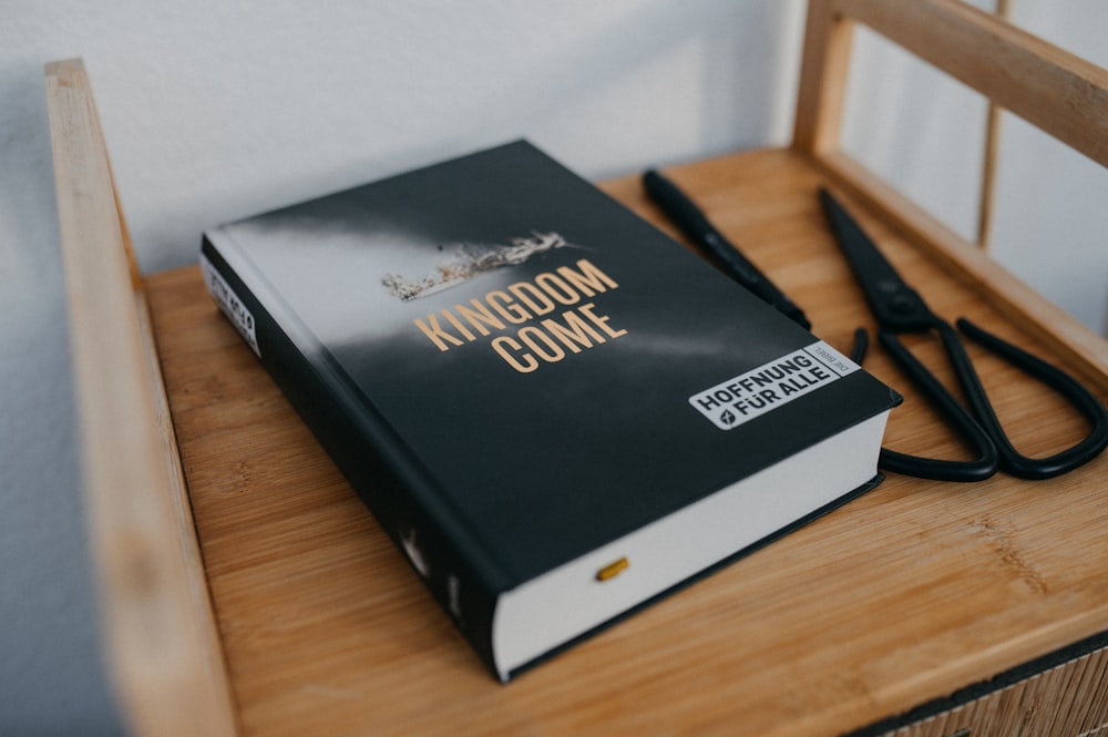 a book sitting on top of a wooden table